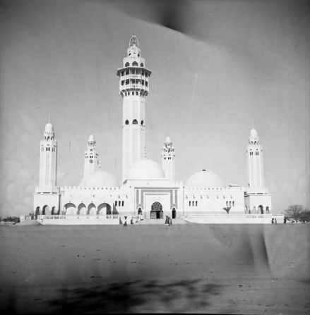 “Mosque of Touba,” by Oumar Ka, c.1959–1968. Ka lived and frequently worked in Touba, a holy city for the <a href="index.php?page=&url=https%3A%2F%2Fwww.britannica.com%2Fplace%2FTouba%23ref14027" target="_blank">Mourides</a> Muslim sect in Senegal and a bustling meeting point.