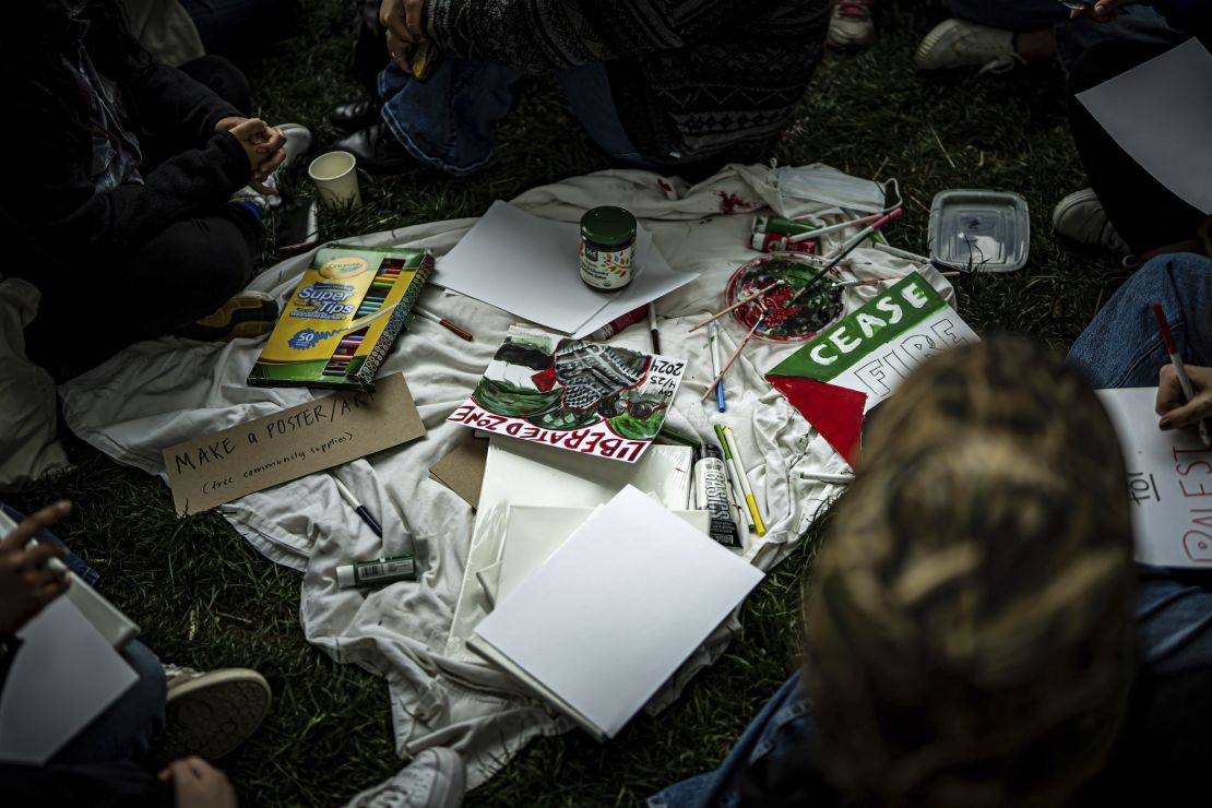 Pro-Palestinian demonstrators gather Thursday at a George Washington University encampment.