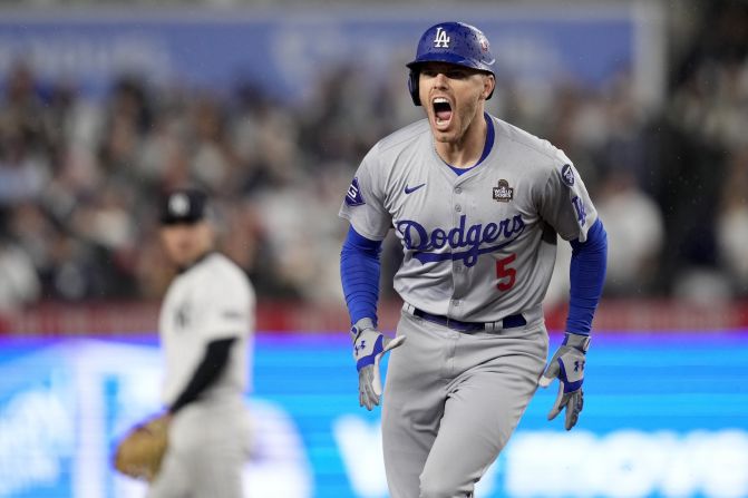 Freeman celebrates his two-run home run in the first inning of Game 4. He homered in the first four games of this World Series.