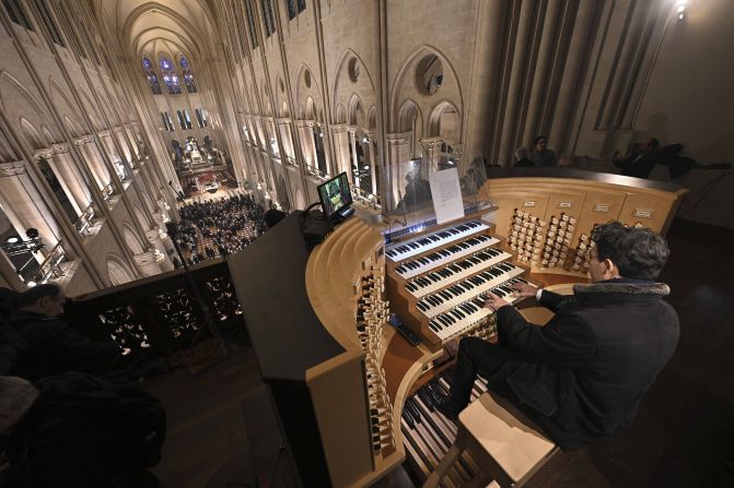 An organist plays during Mass on December 8.