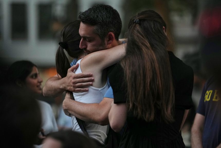 Community members gathered in New York City to honor the victims of the shooting Tuesday evening.