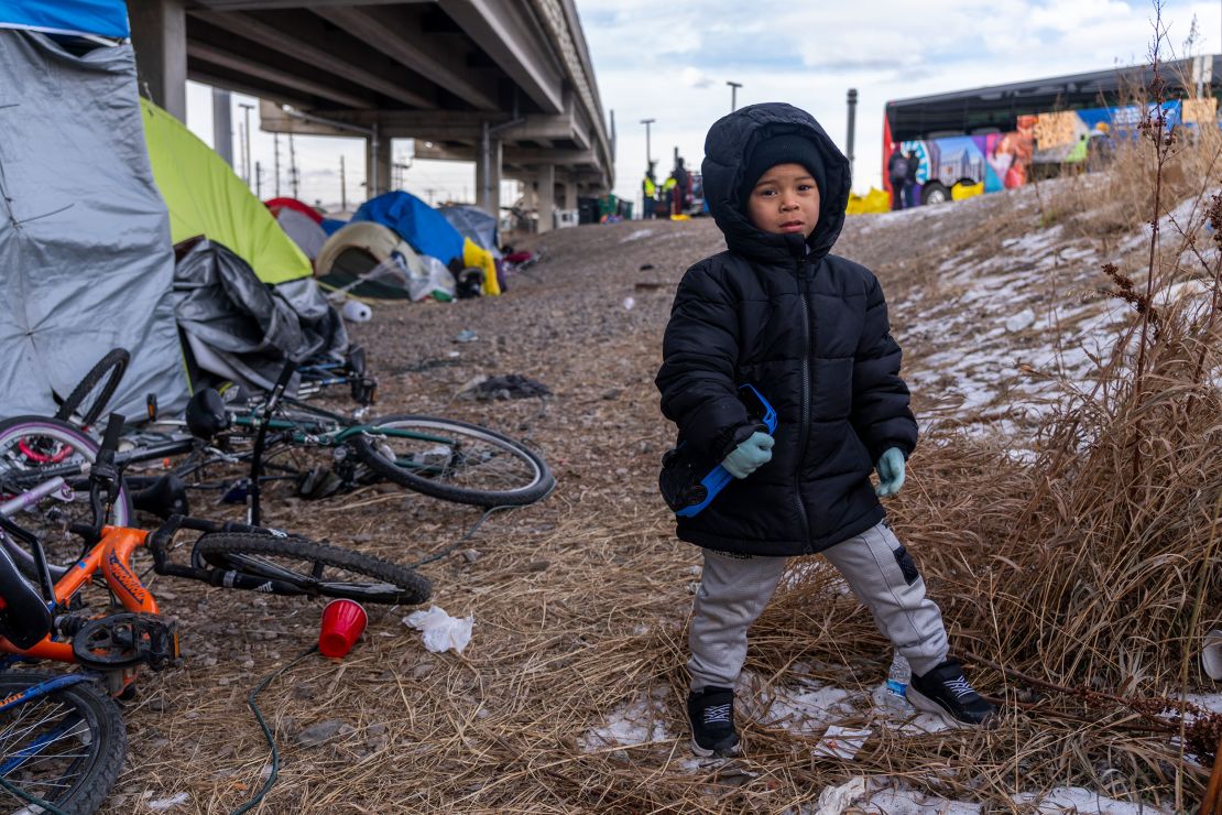 John David, 4, spent a month sleeping in a tent in this encampment. 