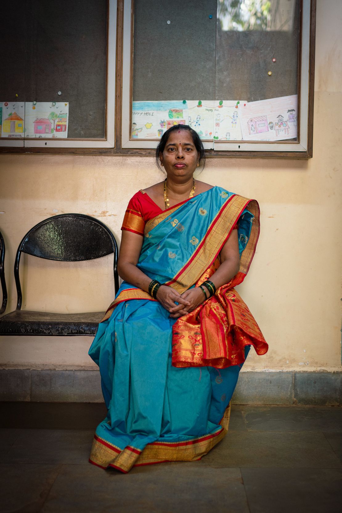 Neeta Jadhav, 46, poses for a picture during an interview with CNN at Manohar Joshi College in Dharavi on April 14.