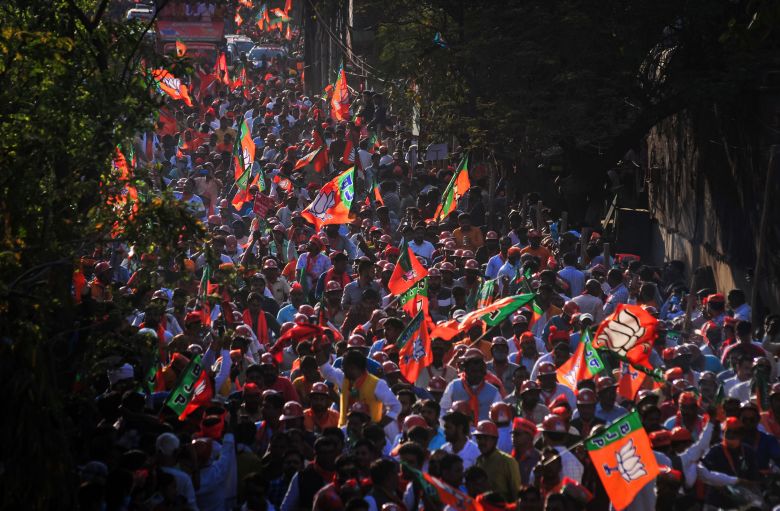Supporters of Modi’s BJP, a Hindu nationalist party that has pushed Hindi to be India’s national language, rally ahead of state elections in Varanasi, Uttar Pradesh, India, in March 2022.