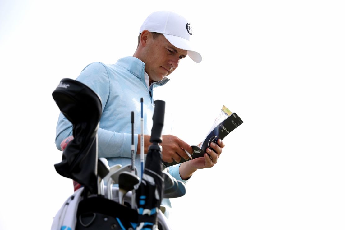 Spieth checks his scorecard during the 2023 Open Championship at Royal Liverpool Golf Club in Hoylake, England.
