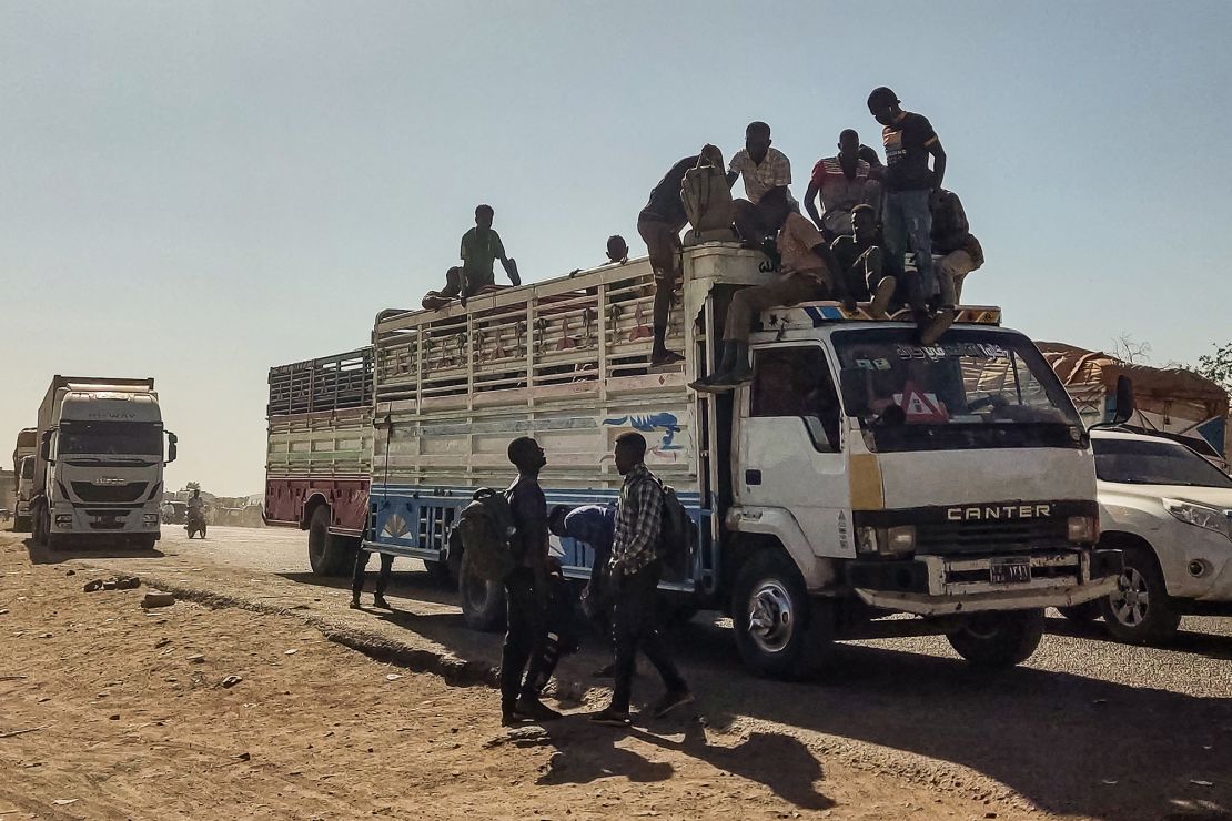 Displaced people fleeing from Jazira state arrive in Gedaref, in the east of war-torn Sudan, on December 22, 2023.