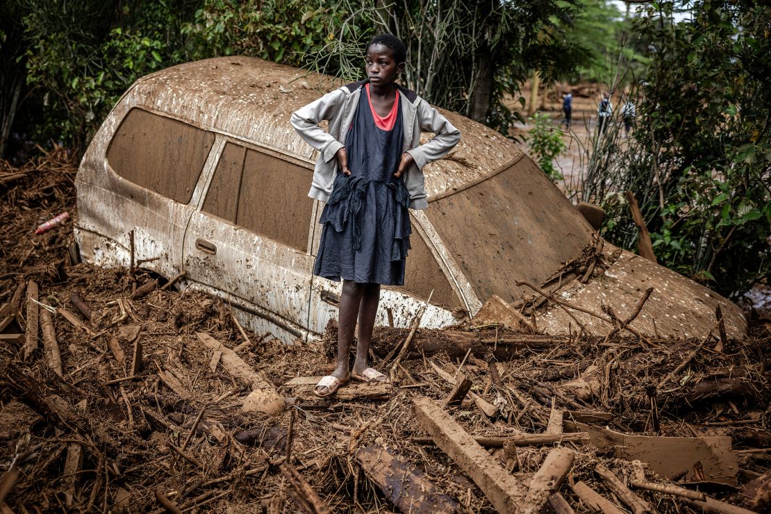 A damaged car buried in mud in an area heavily affected by torrential rains and flash floods in the village of Kamuchiri, near Mai Mahiu, on April 29.