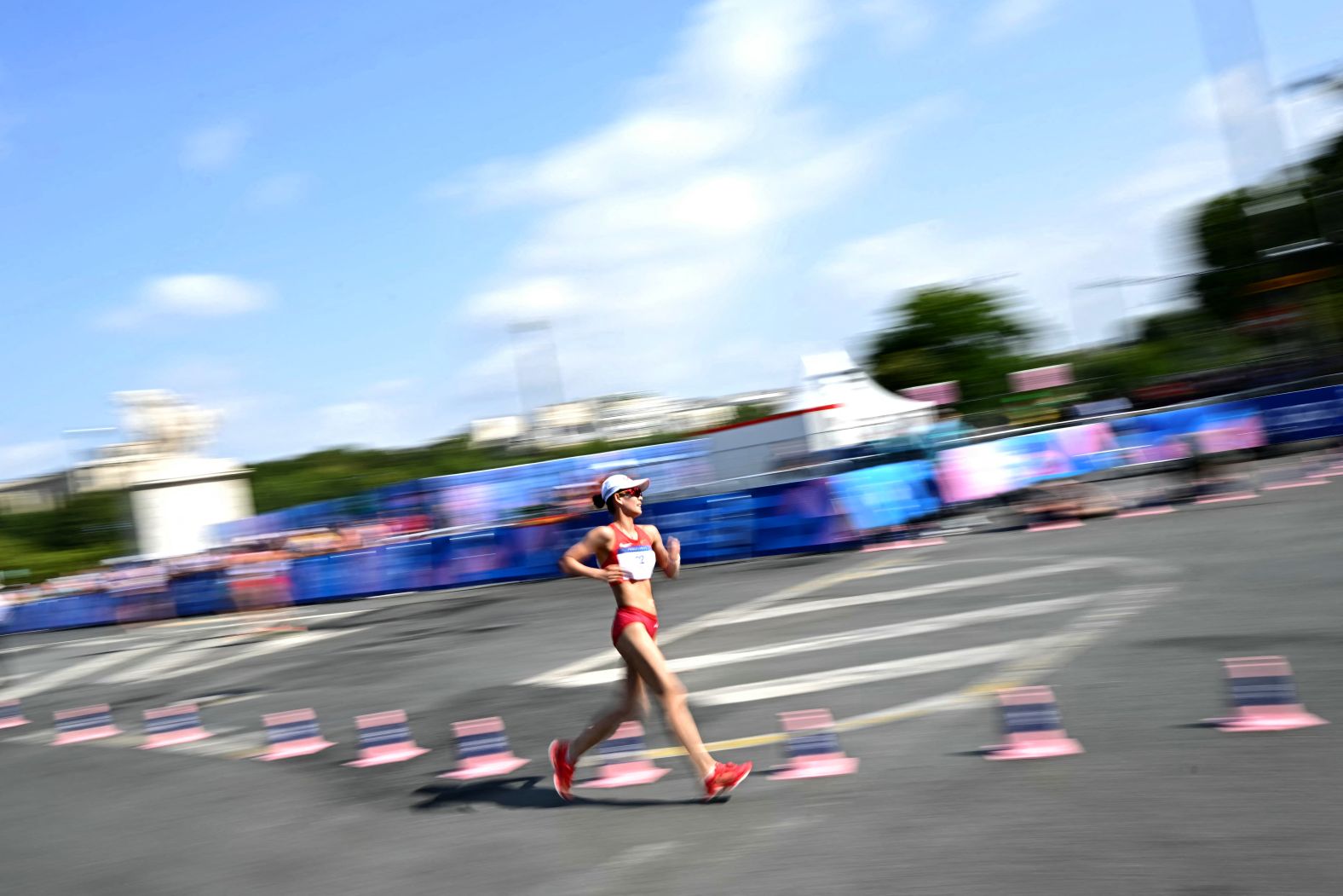 China's Yang Jiayu competes in the 20-kilometer race walk, <a >which she won</a> on August 1.