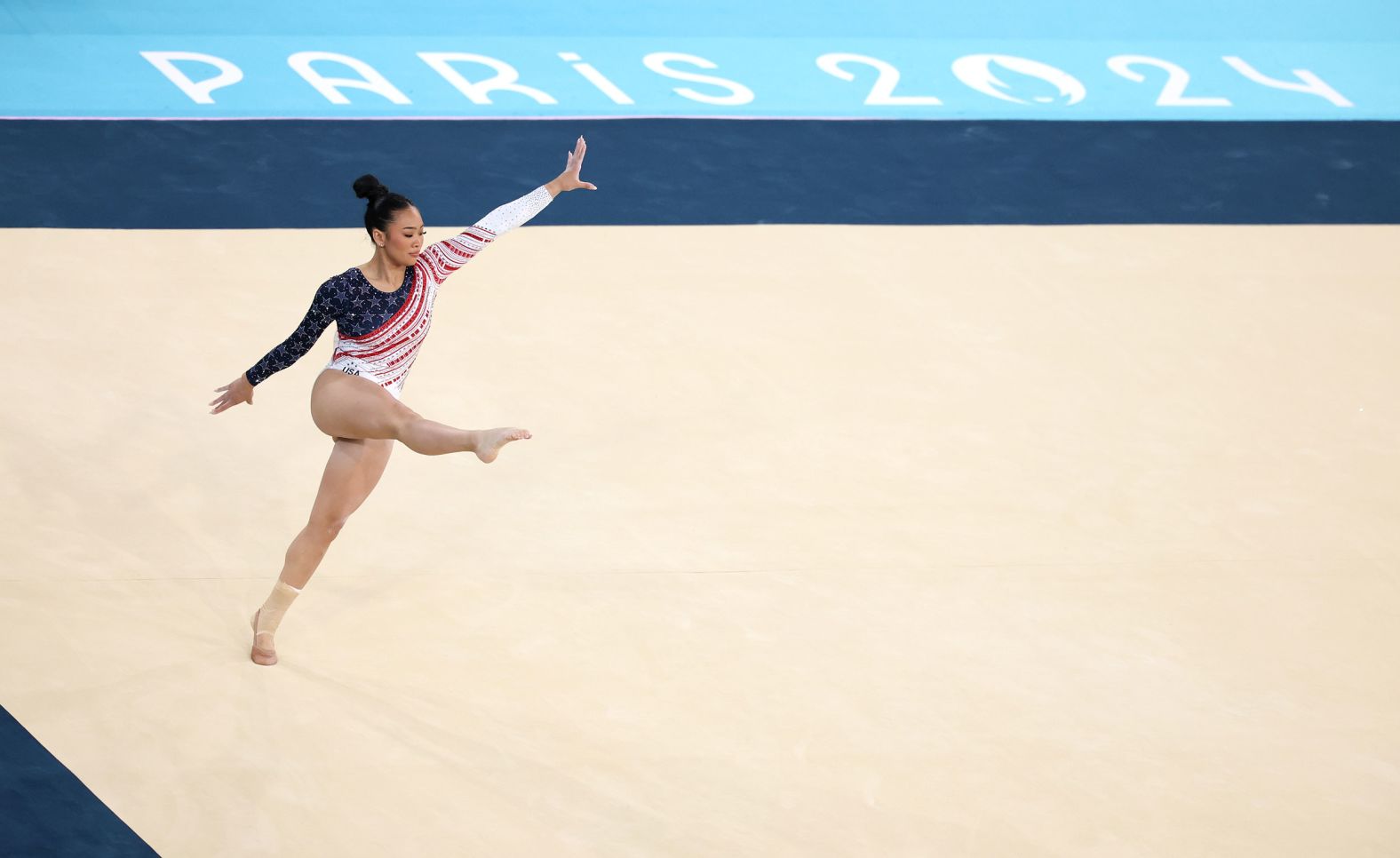 Lee performs her floor exercise during the last rotation of the day.