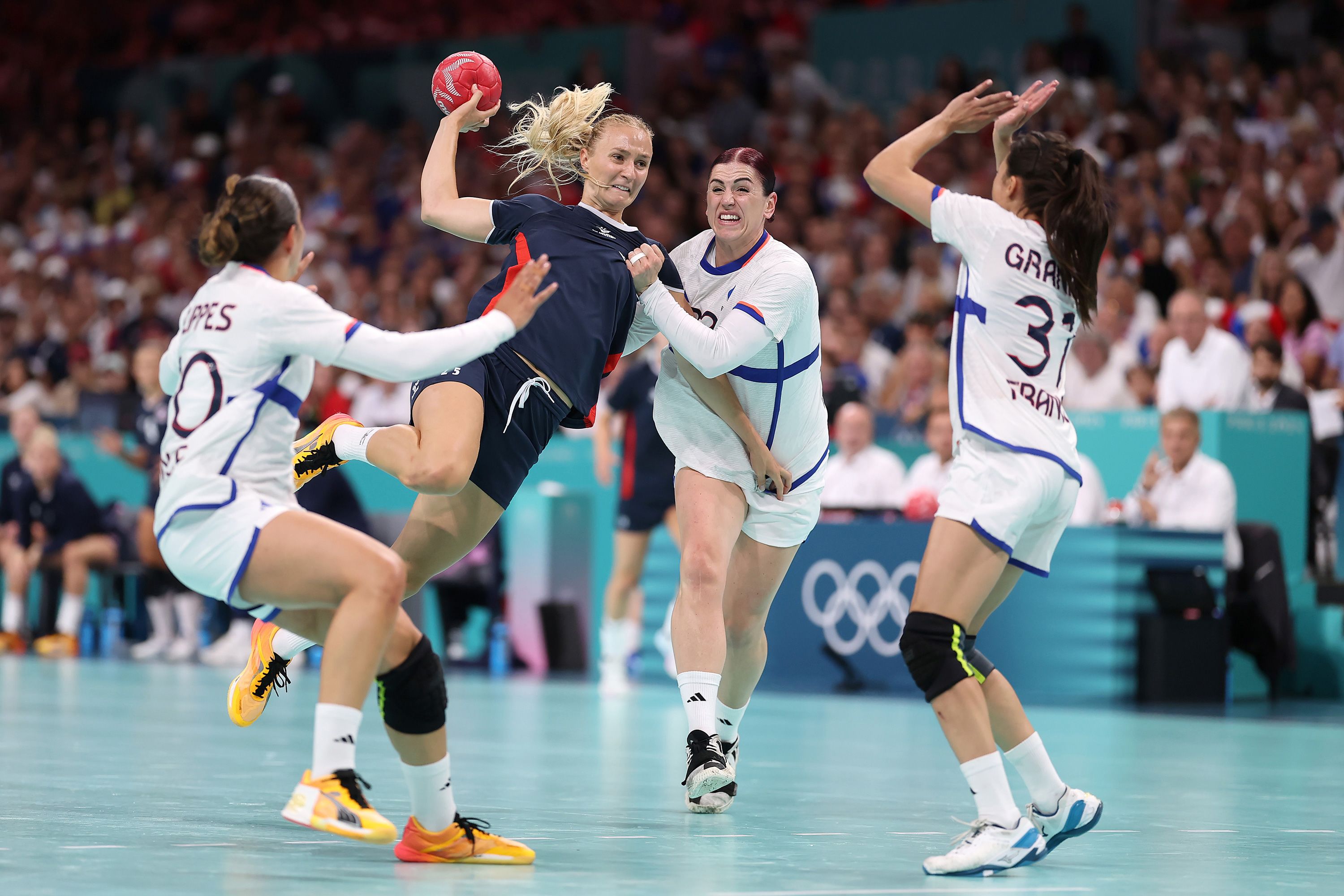 Norway’s Henny Reistad looks to shoot the ball against France during the women’s handball final on August 10. <a href="https://www.cnn.com/sport/live-news/paris-olympics-news-2024-08-10#h_76dd6a68c7ba943ea79926671e961231">Norway won 29-21</a> to earn the gold medal.