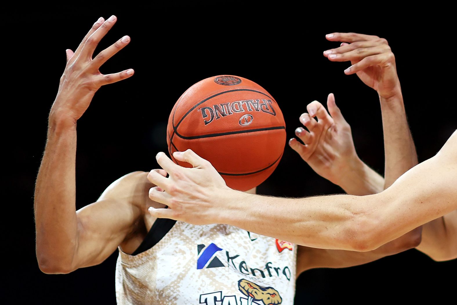 Dillon Stith, a pro basketball player with the Cairns Taipans, tries to gather the ball during an NBL match in Sydney on Sunday, January 12.