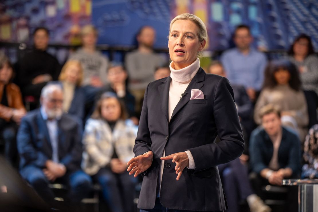 Co-leader of the far-right Alternative for Germany party Alice Weidel gestures as she talks with citizens during the TV program 