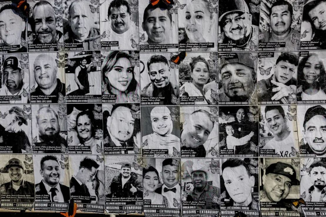 Banner with the faces of ICE detainees during a protest outside federal court in Los Angeles on July 17.