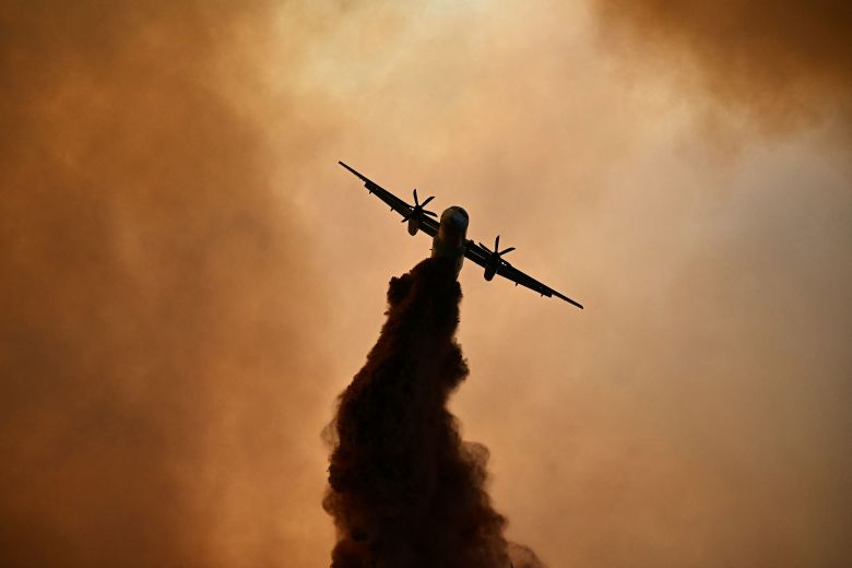 Fire retardant is dropped over a wildfire near Fontjoncouse, France, on Wednesday.