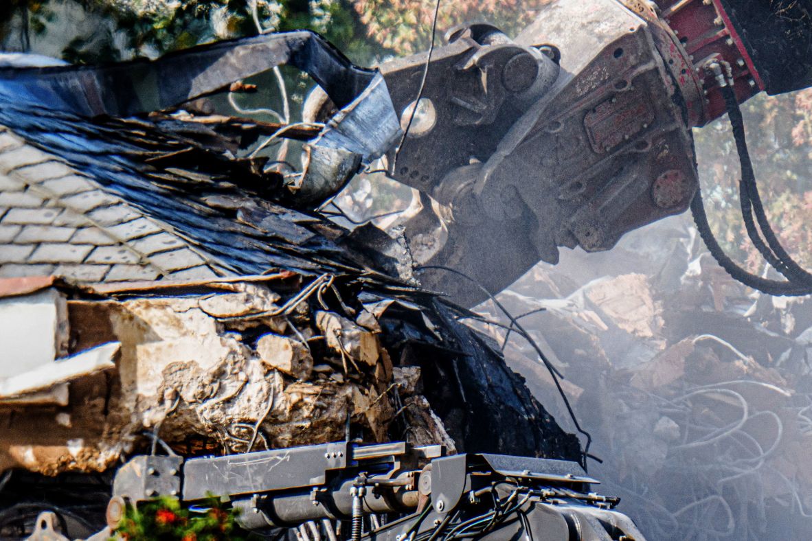 A construction claw tears at a section of the East Wing on October 21.