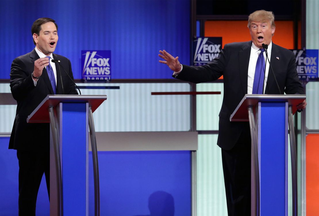 Then-Republican presidential candidates, Sen. Marco Rubio, at left, and Donald Trump, at right, participate in a debate sponsored by Fox News at the Fox Theatre on March 3, 2016 in Detroit, Michigan.