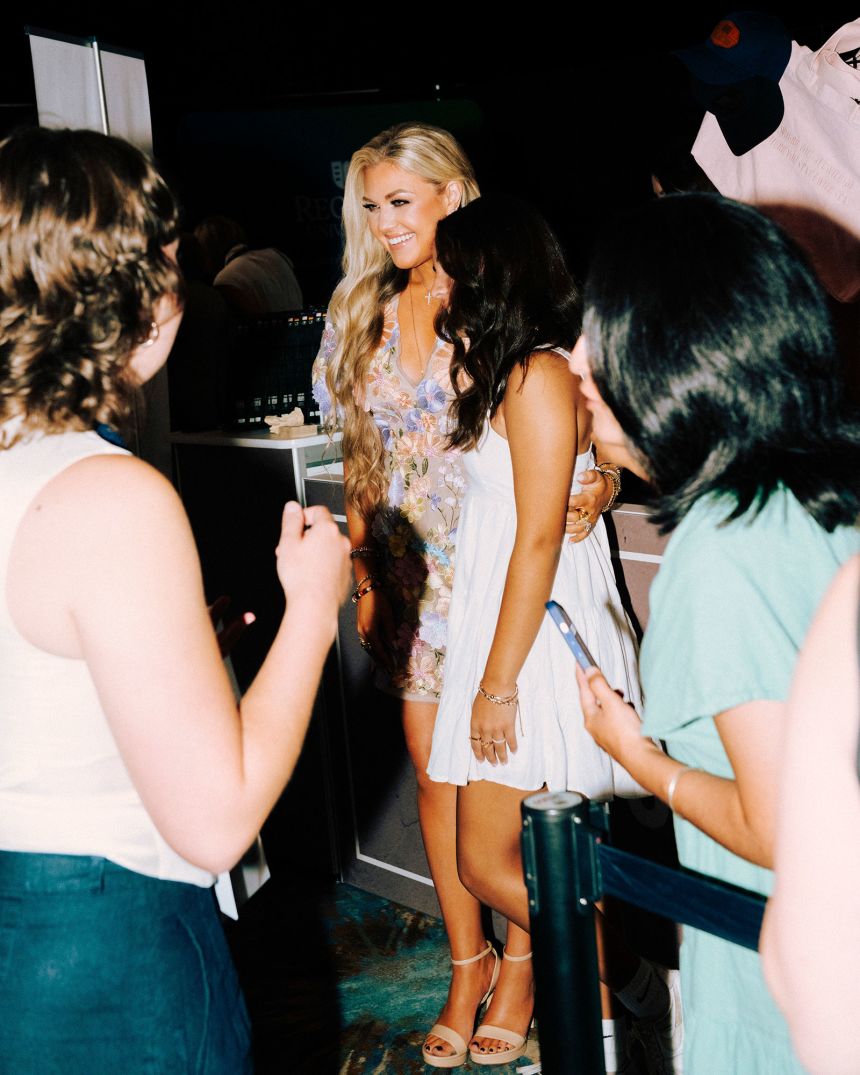 Erika Kirk interacts with attendees at the Turning Point USA Young Women's Leadership Summit in Grapevine, Texas, on June 14, 2025.