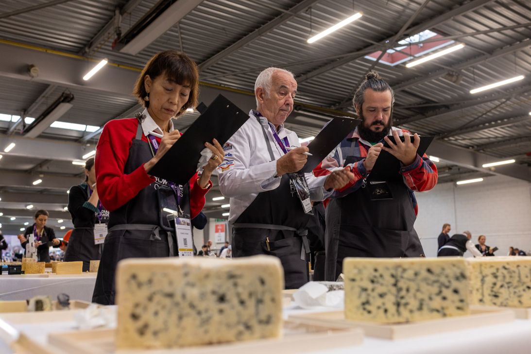 Judges write down their notes at the Mondial du Fromage.