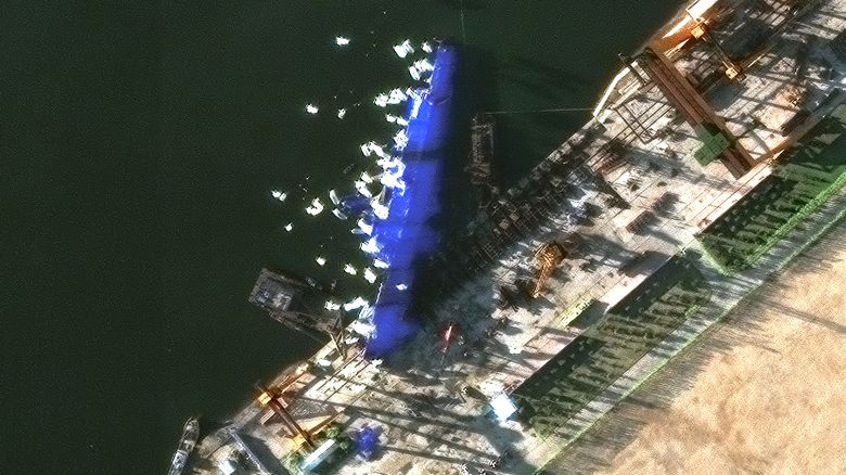 This satellite image shows North Korea’s newly launched destroyer lying on its side at Chongjin on May 25, 2025.