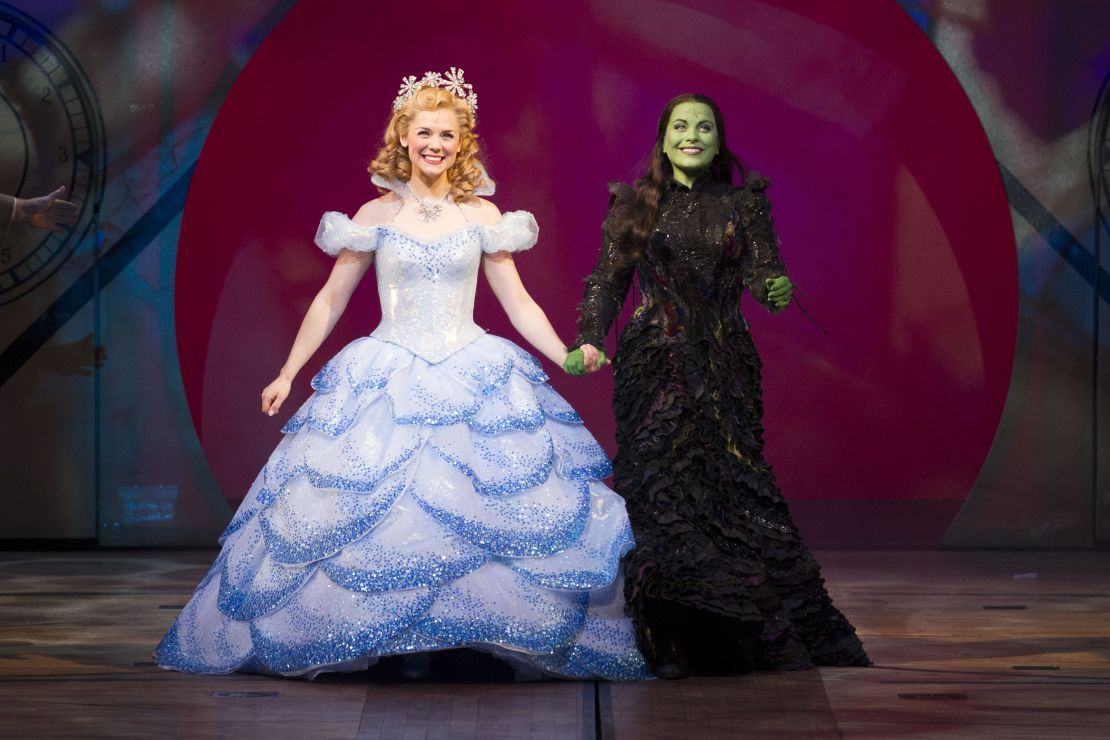 Gina Beck (left) and Louise Dearman (right) take a bow in December 2012. It was Dearman's second time performing in the show — she played Glinda before returning as Elphaba.