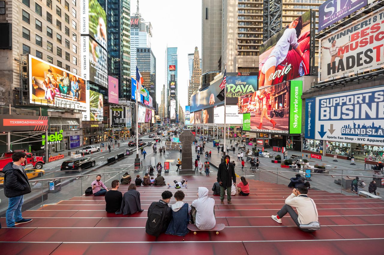 People take in the view at Times Square in New York on March 9.