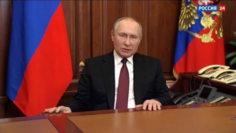 Russian state television broadcasts an address by President Vladimir Putin on February 24.