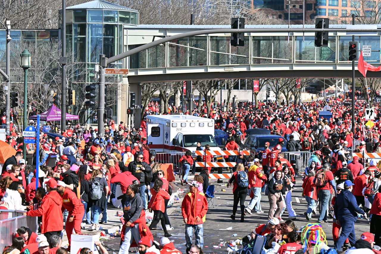 Fans leave the area after shots were fired.