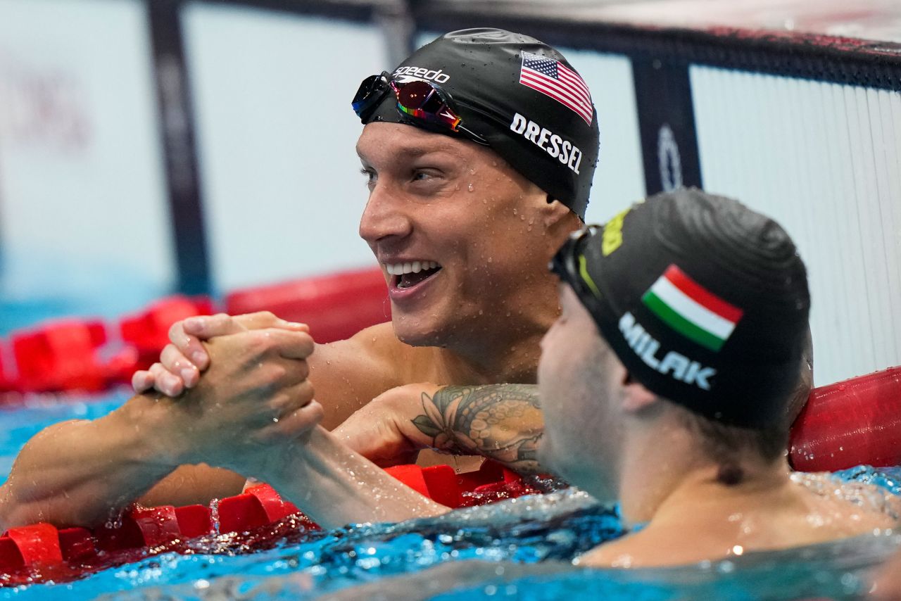 The United States' Caeleb Dressel, left, celebrates with Hungary's Kristof Milak after they finished 1-2 in the 100-meter butterfly on Saturday.