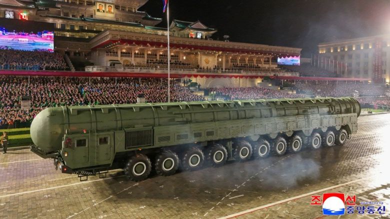 A transporter launcher North Korean state media said is the new Hwasong-20 intercontinental ballistic missile is shown during an overnight military parade in Pyongyang.