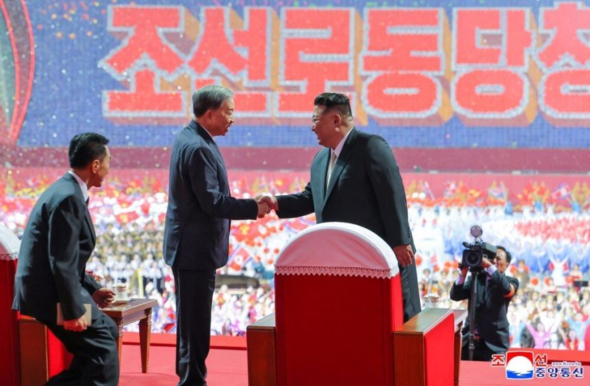 North Korean leader Kim Jong shakes hands with Vietnam’s Communist Party chief To Lam during a celebration in Pyongyang on October 9, 2025, in this photo released by North Korean state media KCNA.