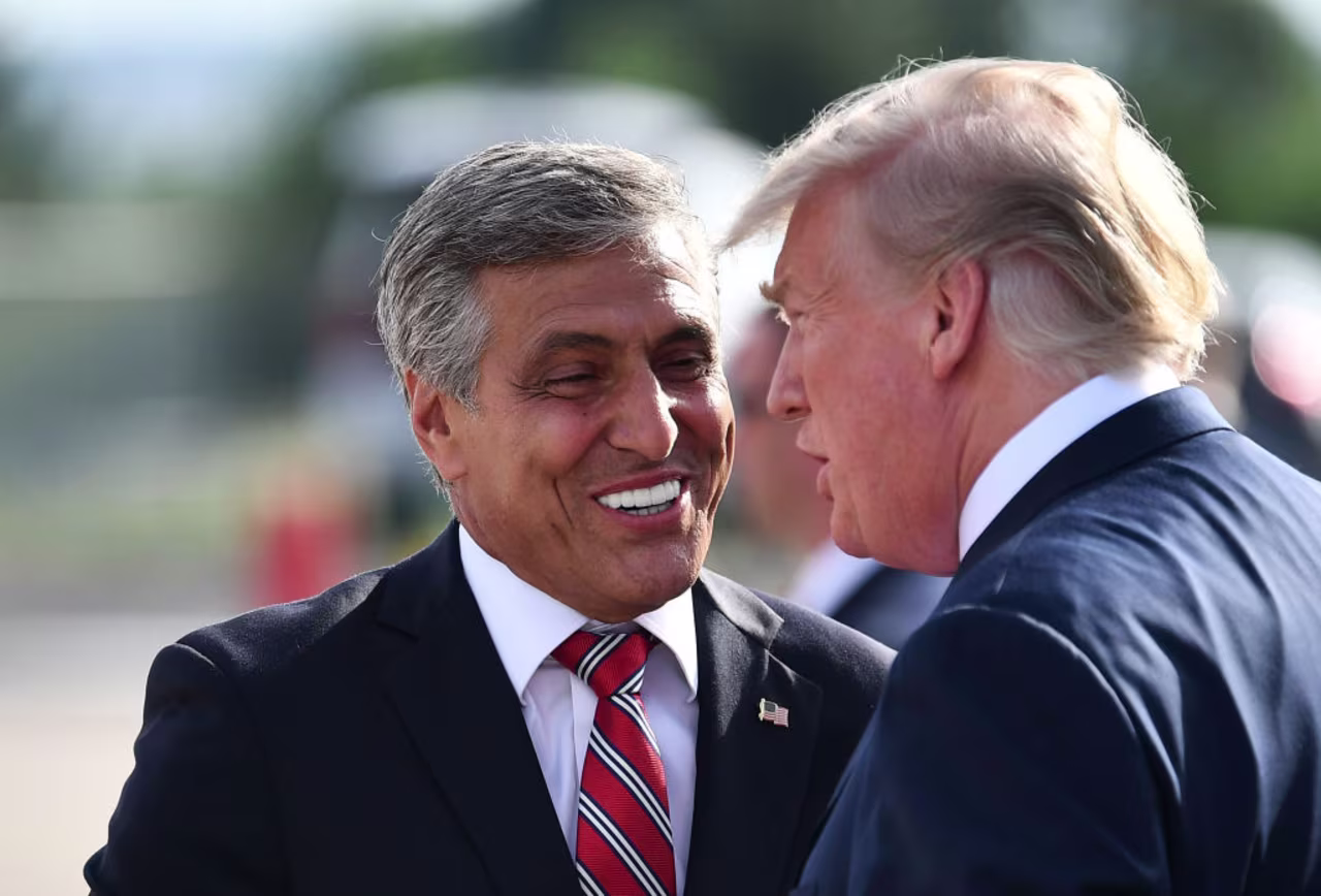 Republican Senate candidate Lou Barletta (L) greets President Donald Trump upon arrival at Wilkes-Barre/Scranton International Airport in Avoca, Pennsylvania on August 2, 2018.