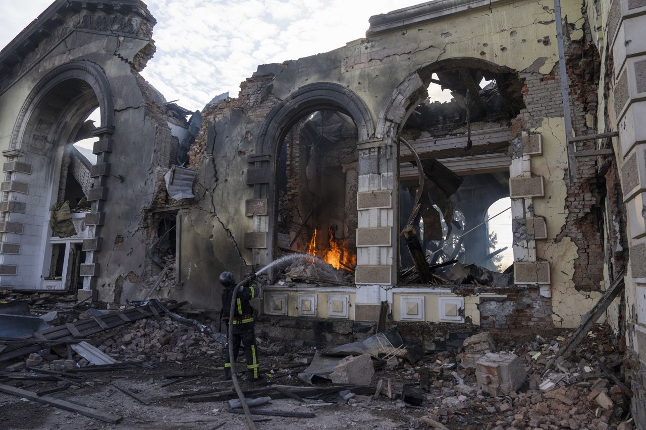 Firefighters work to put out the flames at the Kostiantynivka train station in the Donbas region of Ukraine on February 25. 