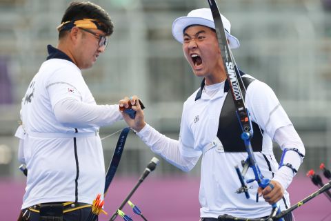 South Korea’s Kim Je-deok celebrates winning the gold medal in the archery team competition on July 26. 