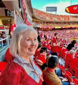 Kayren Spain watches a Kansas City Chiefs game at Arrowhead Stadium.