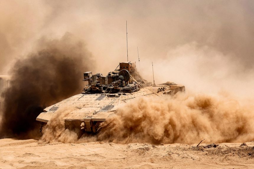 An Israeli army infantry fighting vehicle along the border with the Gaza Strip and southern Israel on July 29, 2025.