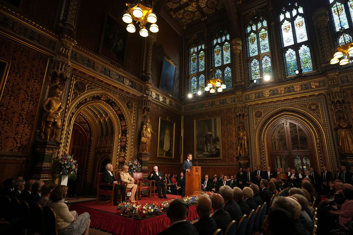 French President Emmanuel Macron, in London for a <a  target="_top" href="/newspapers?url=https://www.cnn.com/2025/07/08/uk/king-charles-macron-state-visit-intl">three-day state visit</a>, addresses parliament members at the Palace of Westminster on Tuesday, July 8. Macron emphasized the strong ties between his country and the UK, cracking a joke that French people “love monarchy — especially when it’s not at home.”