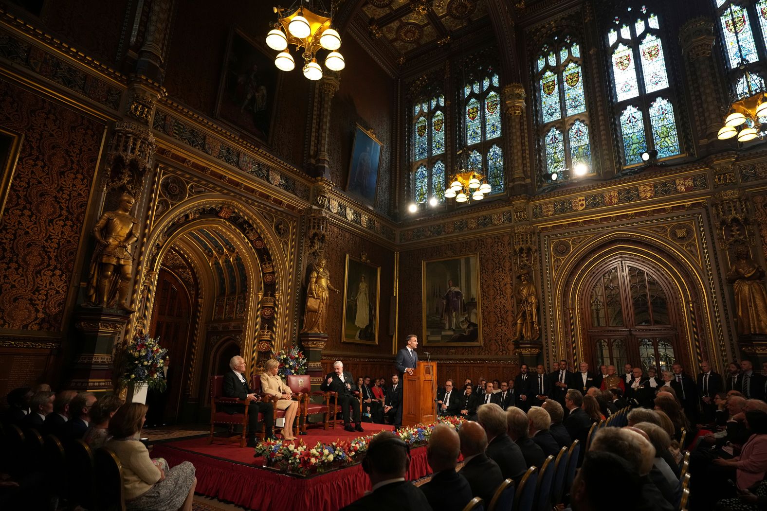 French President Emmanuel Macron, in London for a <a href="index.php?page=&url=https%3A%2F%2Fwww.cnn.com%2F2025%2F07%2F08%2Fuk%2Fking-charles-macron-state-visit-intl">three-day state visit</a>, addresses parliament members at the Palace of Westminster on Tuesday, July 8. Macron emphasized the strong ties between his country and the UK, cracking a joke that French people “love monarchy — especially when it’s not at home.”