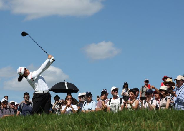 China's Yin Ruoning hits a tee shot during the second round of the golf competition on August 8.