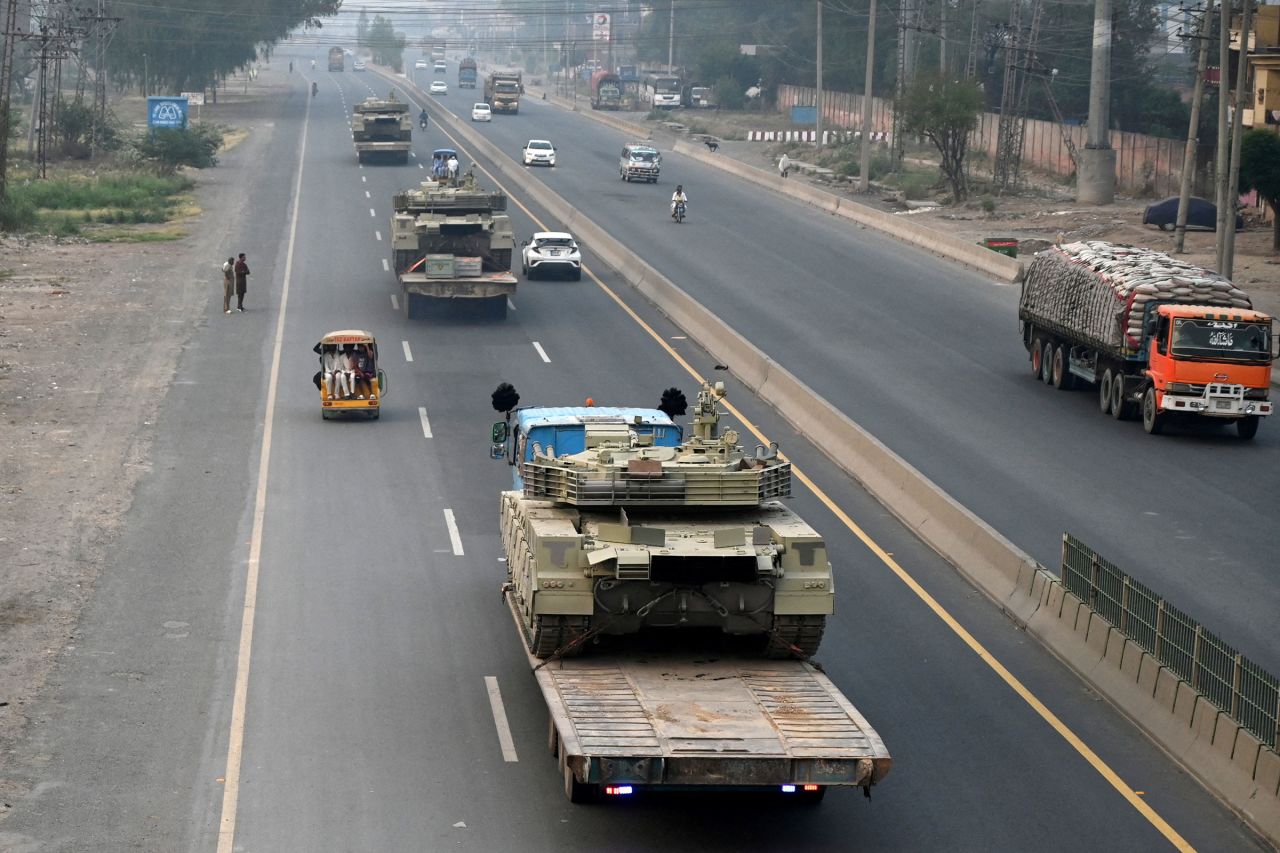 Tanks are transported on a road in Muridke, Pakistan, on Wednesday.
