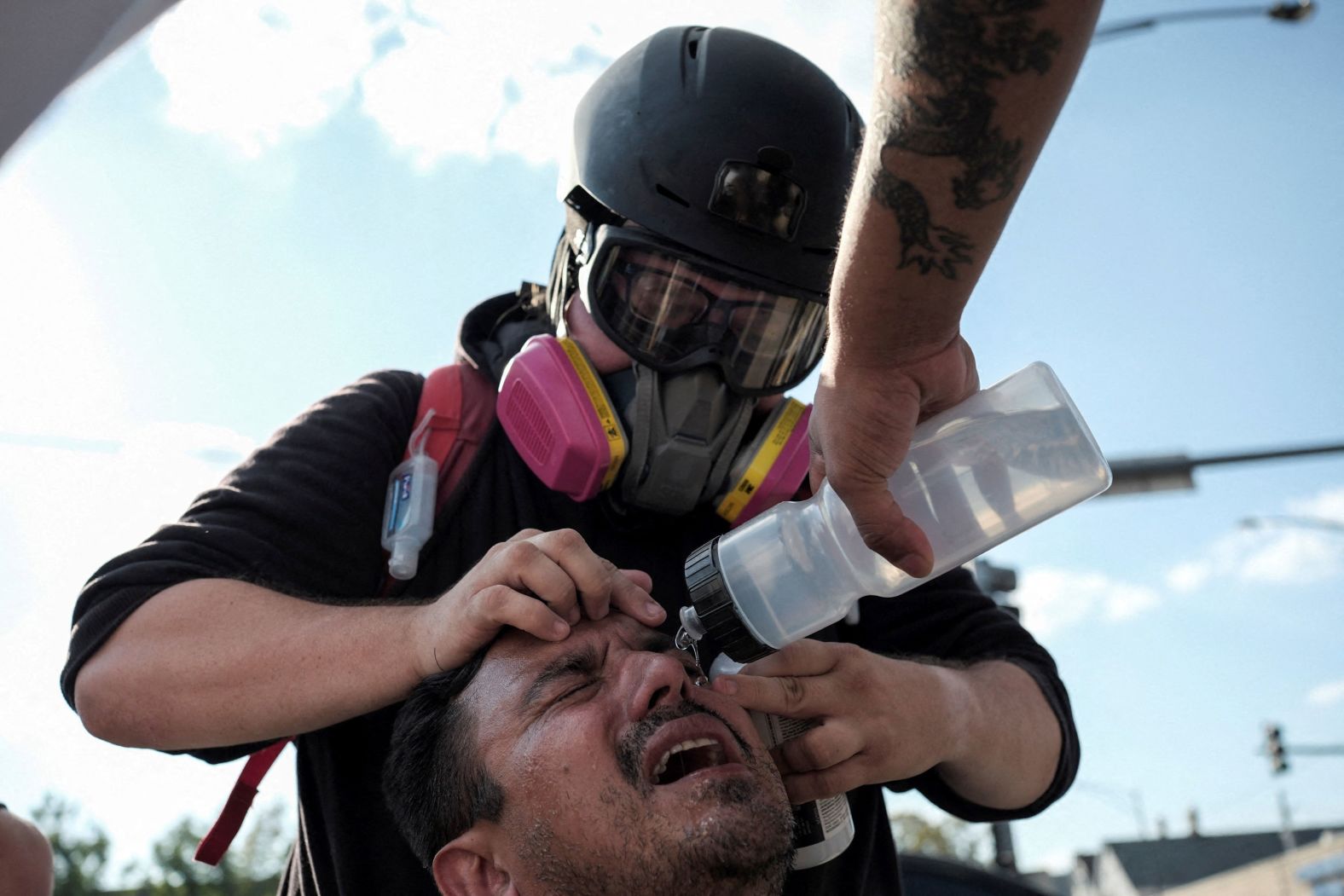A protester receives assistance after being hit with tear gas during a standoff with federal agents in Chicago on Saturday, October 4. <a href="index.php?page=&url=https%3A%2F%2Fwww.cnn.com%2F2025%2F10%2F03%2Fus%2Fchicago-apartment-ice-raid">Federal agents have been deployed on the streets of Chicago in recent weeks</a>, arresting hundreds of undocumented immigrants during what the Trump administration is calling Operation Midway Blitz, according to a <a href="index.php?page=&url=https%3A%2F%2Fwww.dhs.gov%2Fnews%2F2025%2F10%2F01%2Fdhs-arrests-more-800-illegal-aliens-including-worst-worst-criminals-operation" target="_blank">news release</a> from the Department of Homeland Security.
