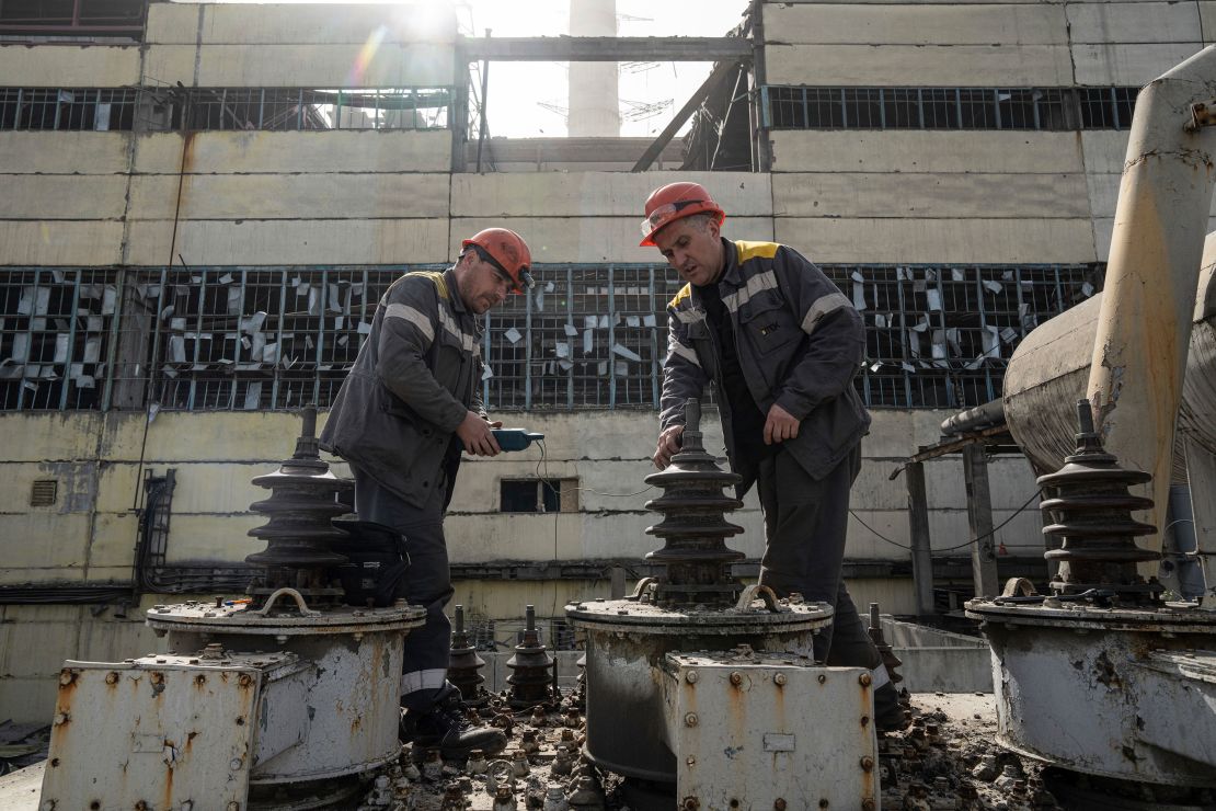Workers check a transformer which was damaged by a Russian missile attack at DTEK's power plant in Ukraine, on Monday, April 1, 2024.
