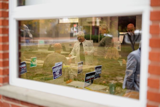 Voters receive their ballots at a polling place in Springfield, Pennsylvania, on Tuesday.