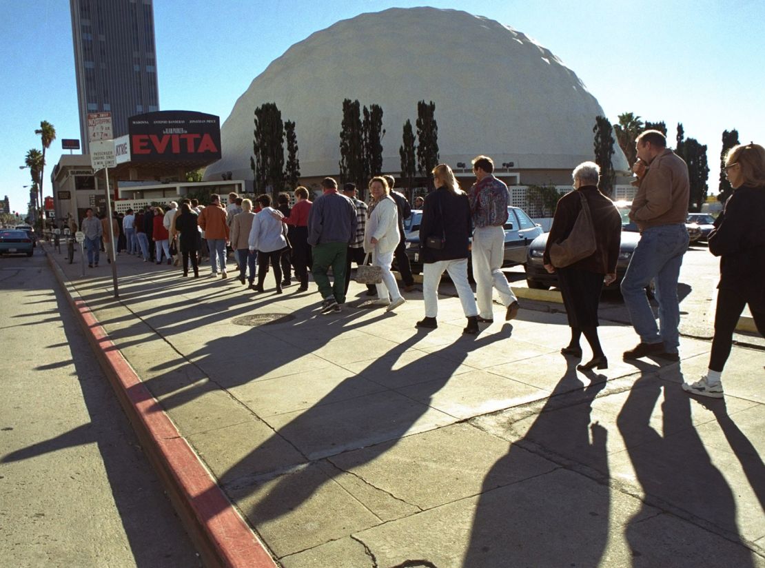 On Christmas day in 1996, a large crowd lined up to get the best seats possible for the very first showing of the new movie "Evita" at the Cinerama theater on Sunset Boulevard in Los Angeles.