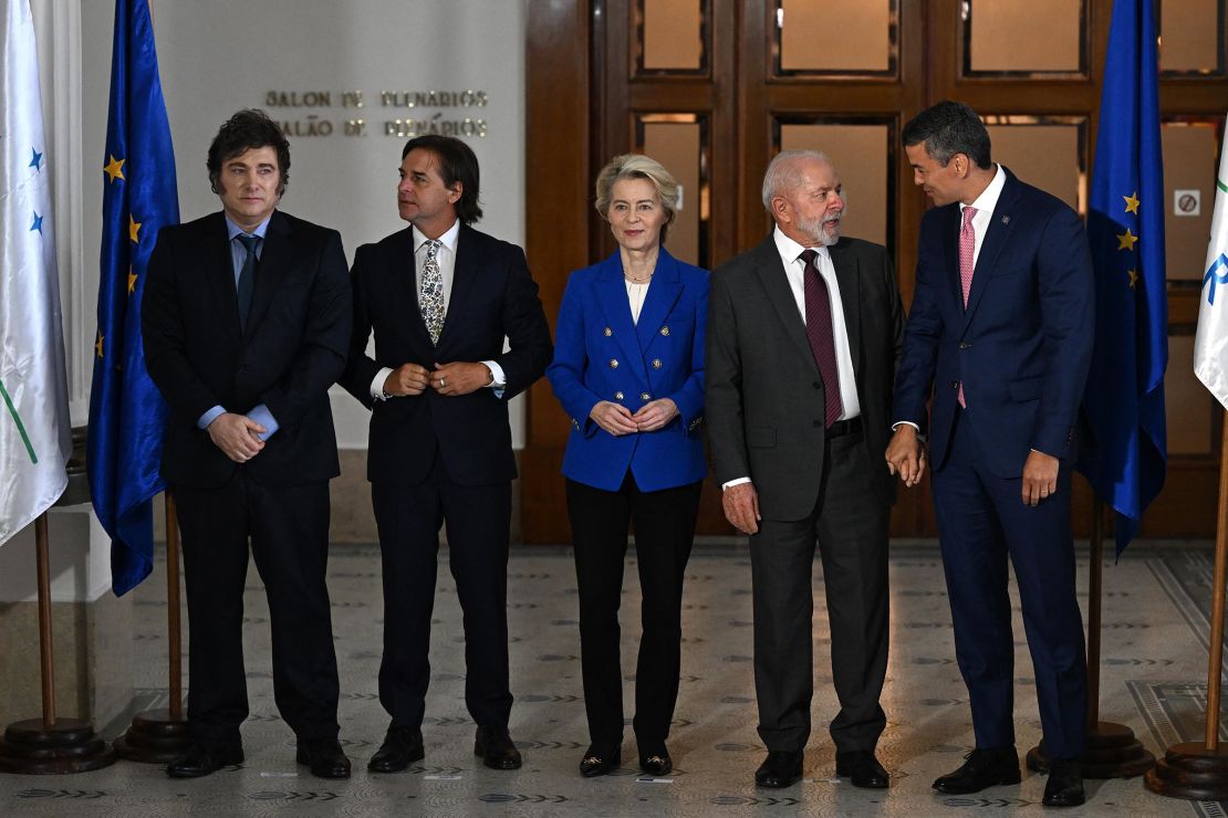 Argentina's President Javier Milei, Uruguay's President Luis Lacalle Pou, European Commission President Ursula von der Leyen, Brazil's President Luiz Inacio Lula da Silva and Paraguay's President Santiago Pena pose for the family picture of the LXV Mercosur Summit in Montevideo, Uruguay, on December 6.