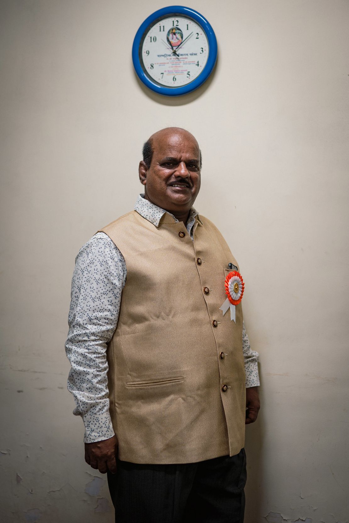 Dilip Gabekar, 60, poses for a picture during an interview with CNN at Manohar Joshi College in Dharavi on April 14.
