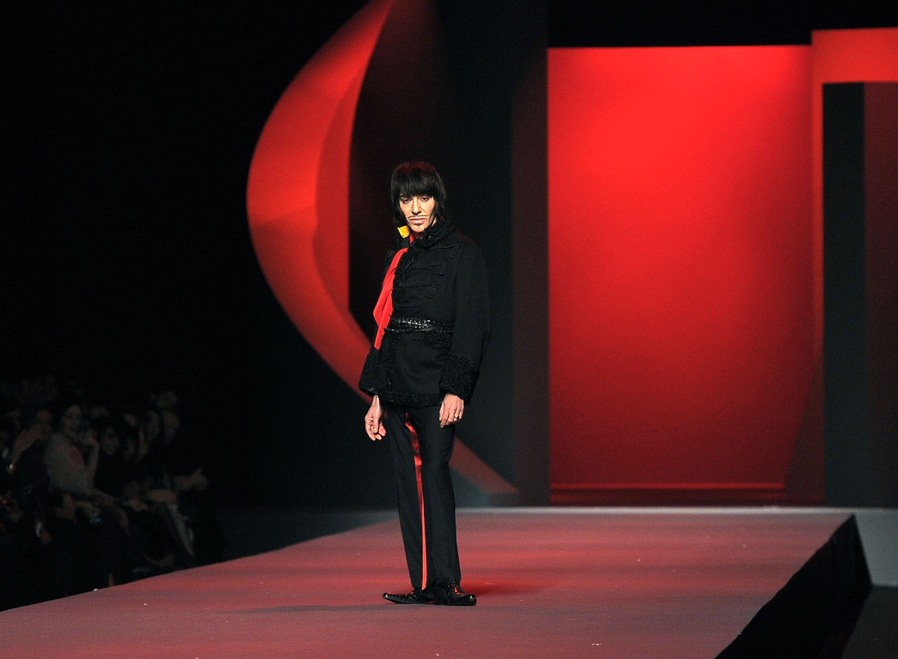 John Galliano walks the runway during a Dior Haute Couture show at Musee Rodin on January 24, 2011 in Paris, France — his last appearance as the fashion house's creative director.