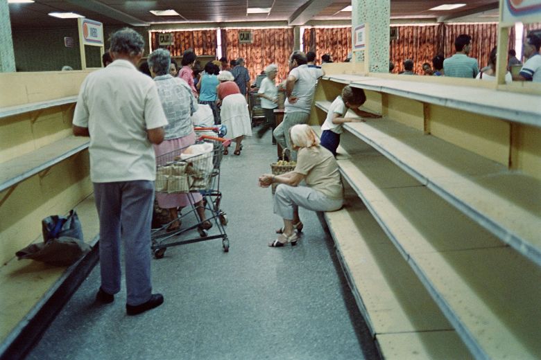 In a scene typical of Cuba's "Special Period" after the fall of the USSR, a Havana supermarket's shelves are bare in 1991.