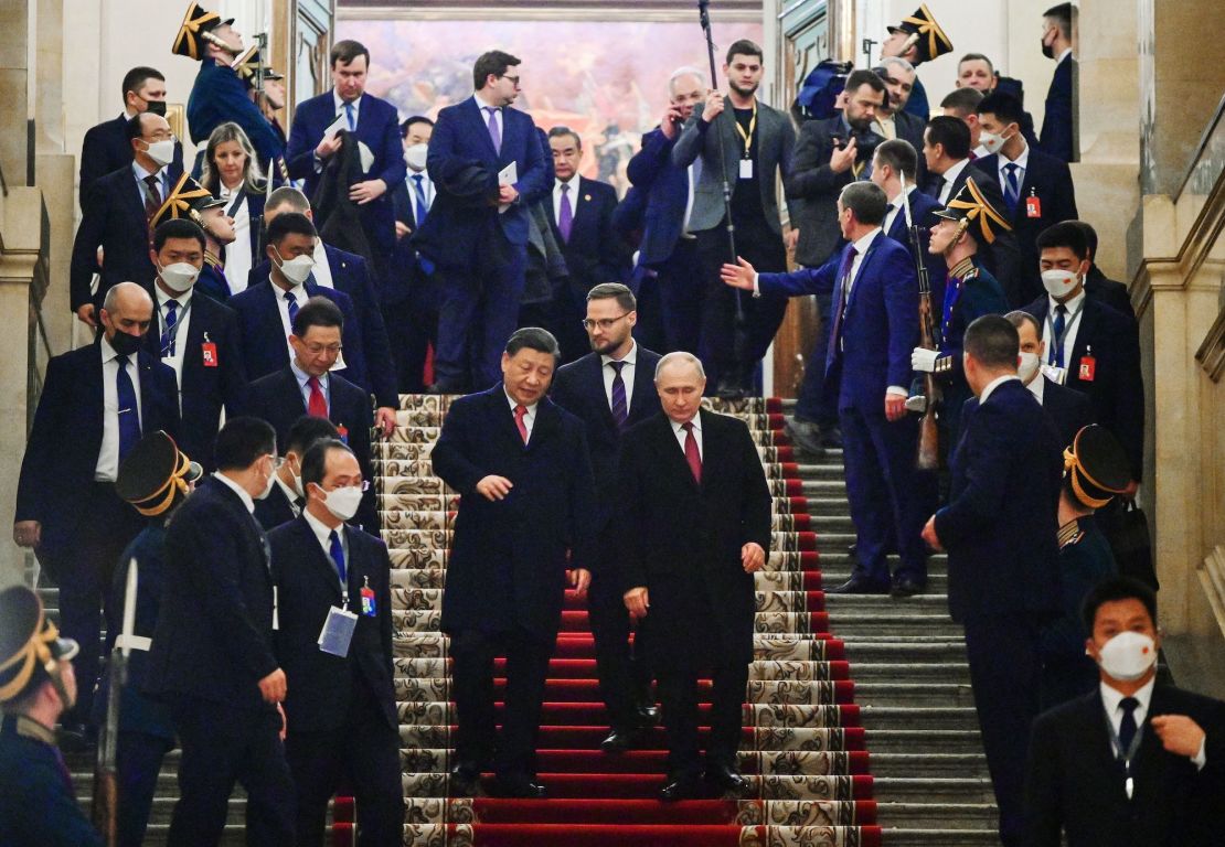 Chinese leader Xi Jinping and Russian President Vladimir Putin leave a reception following talks at the Kremlin in March 2023.
