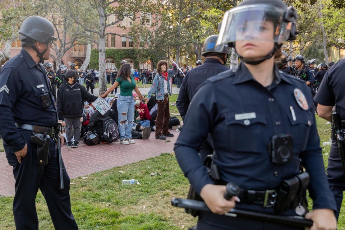 Law enforcement intervenes Wednesday in a Pro-Palestinian student protest in Los Angeles.