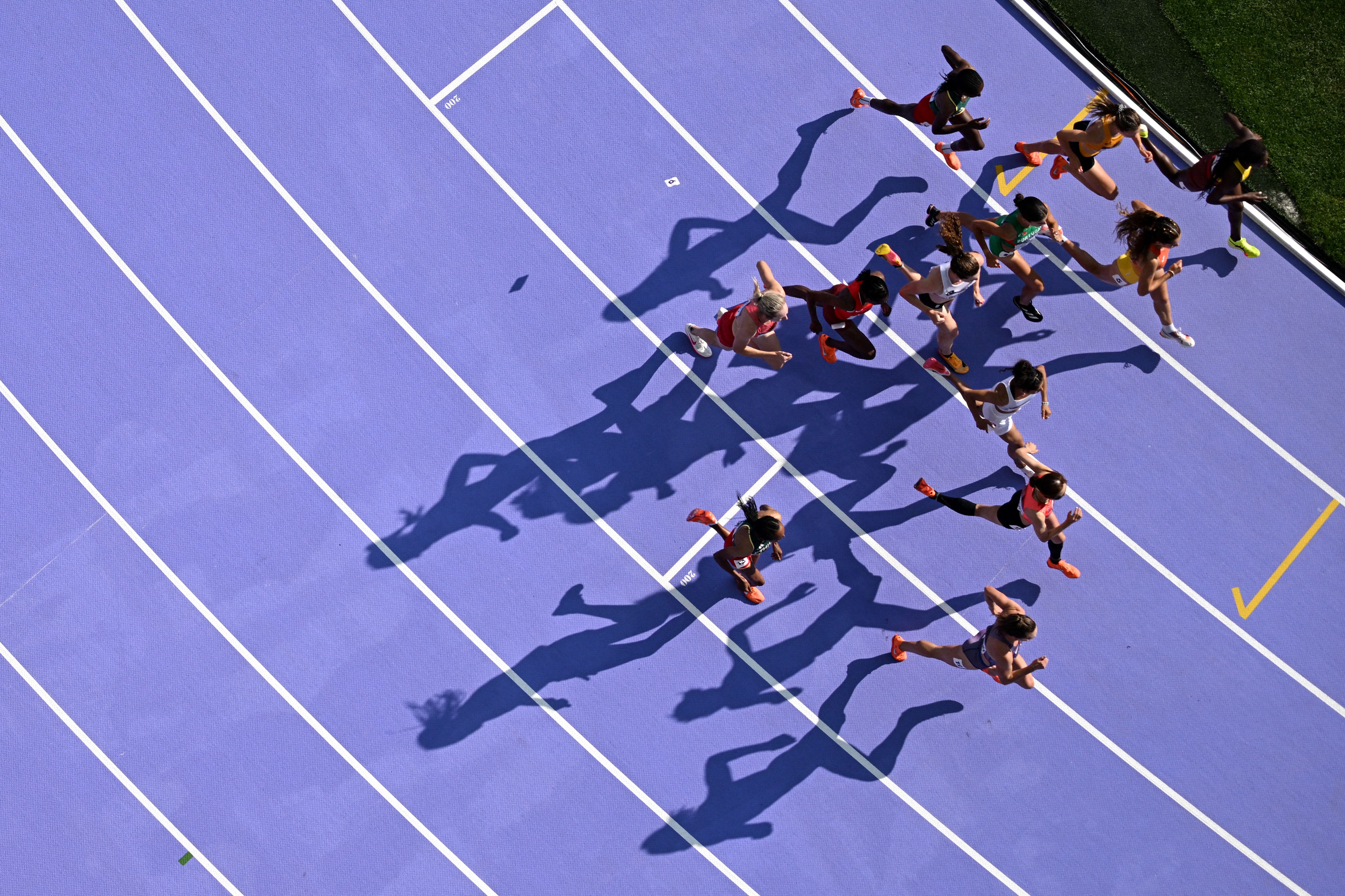 Athletes run the 5,000 meters on August 2.